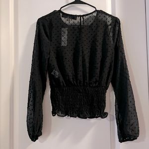Black sheer long sleeve crop top. Size XS. NWT